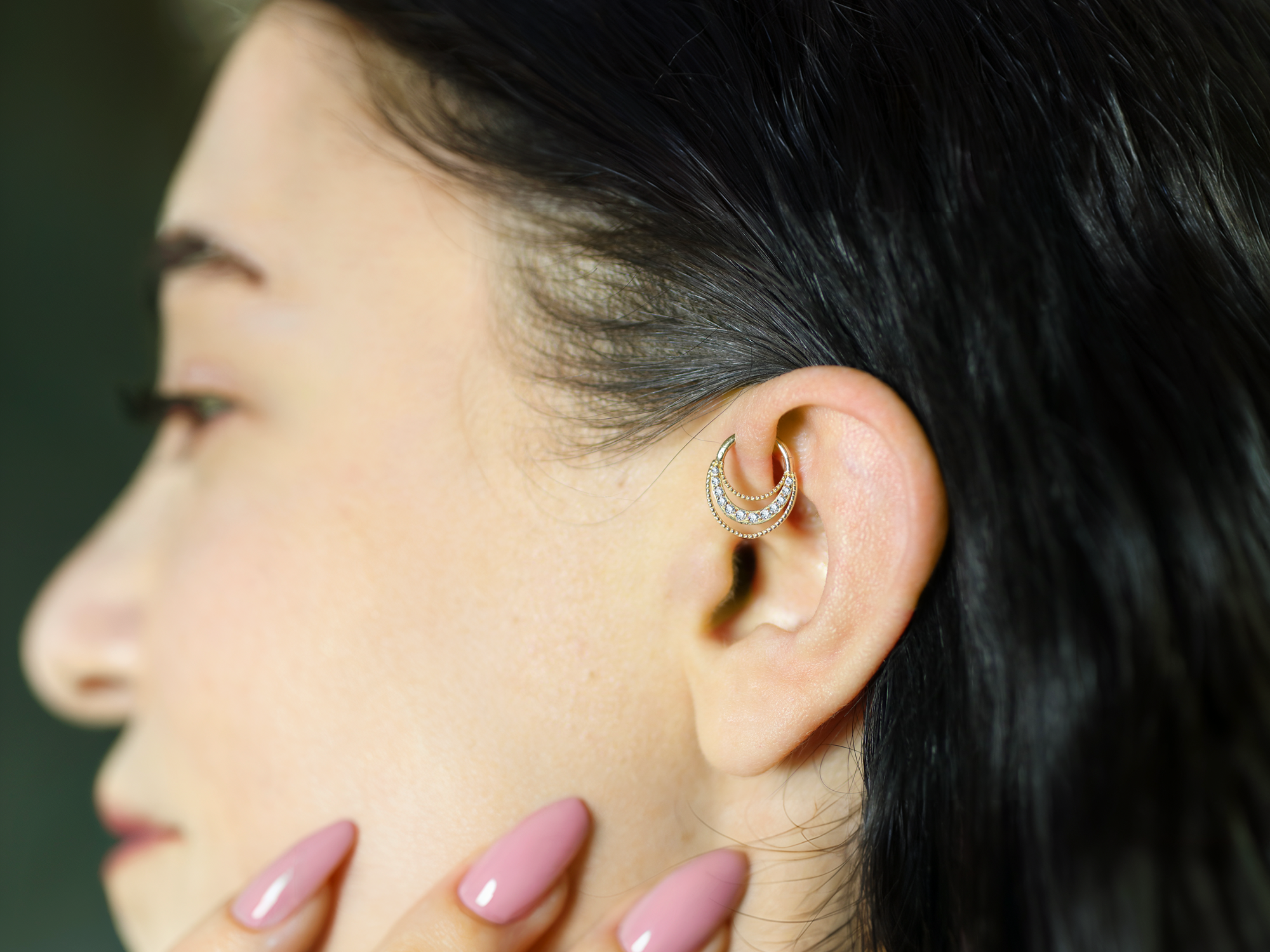 Forward Helix Piercing: A unique ear adornment on the forward cartilage, showcasing modern design and sleek craftsmanship.