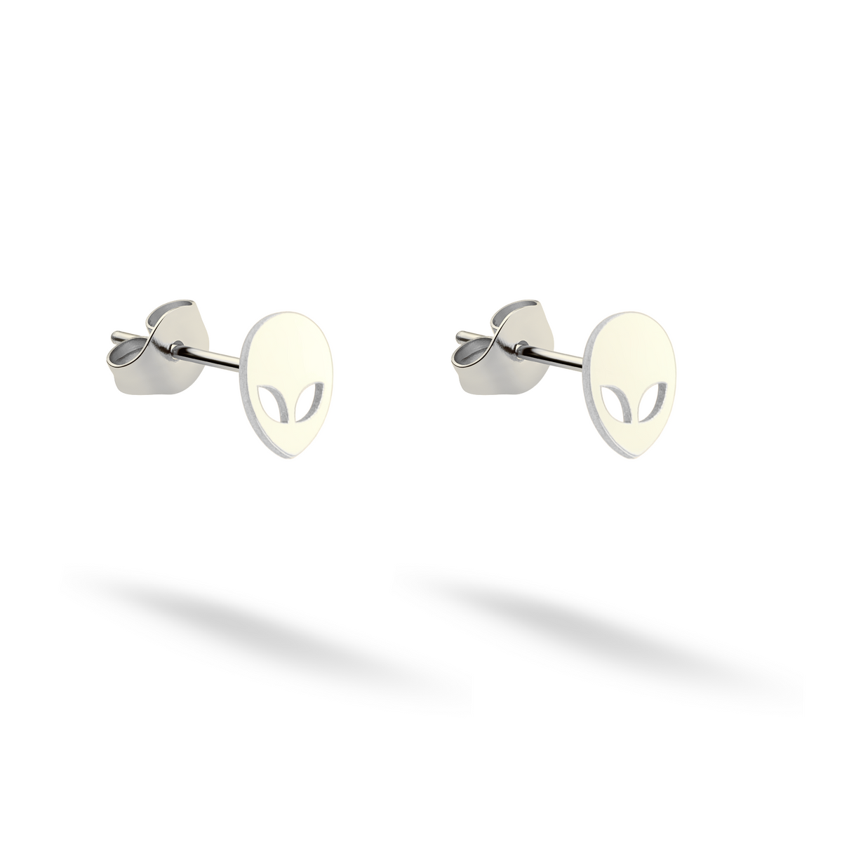 Alien head stud earrings shown in sleek 14K white gold against white
