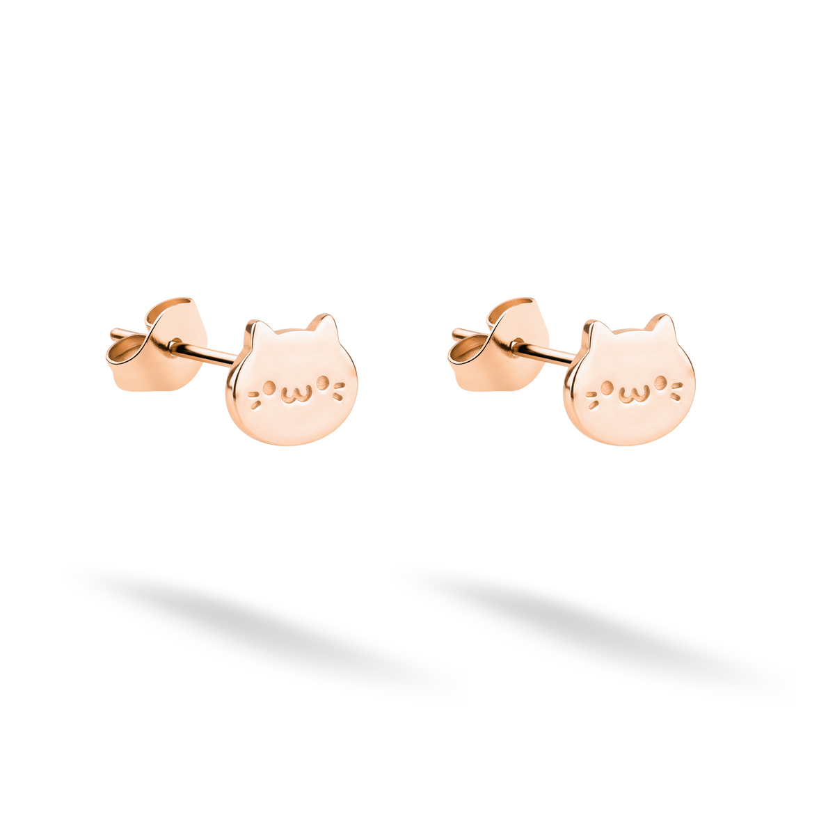 Blush 14K rose gold gives the miniature cat face earrings a soft finish
