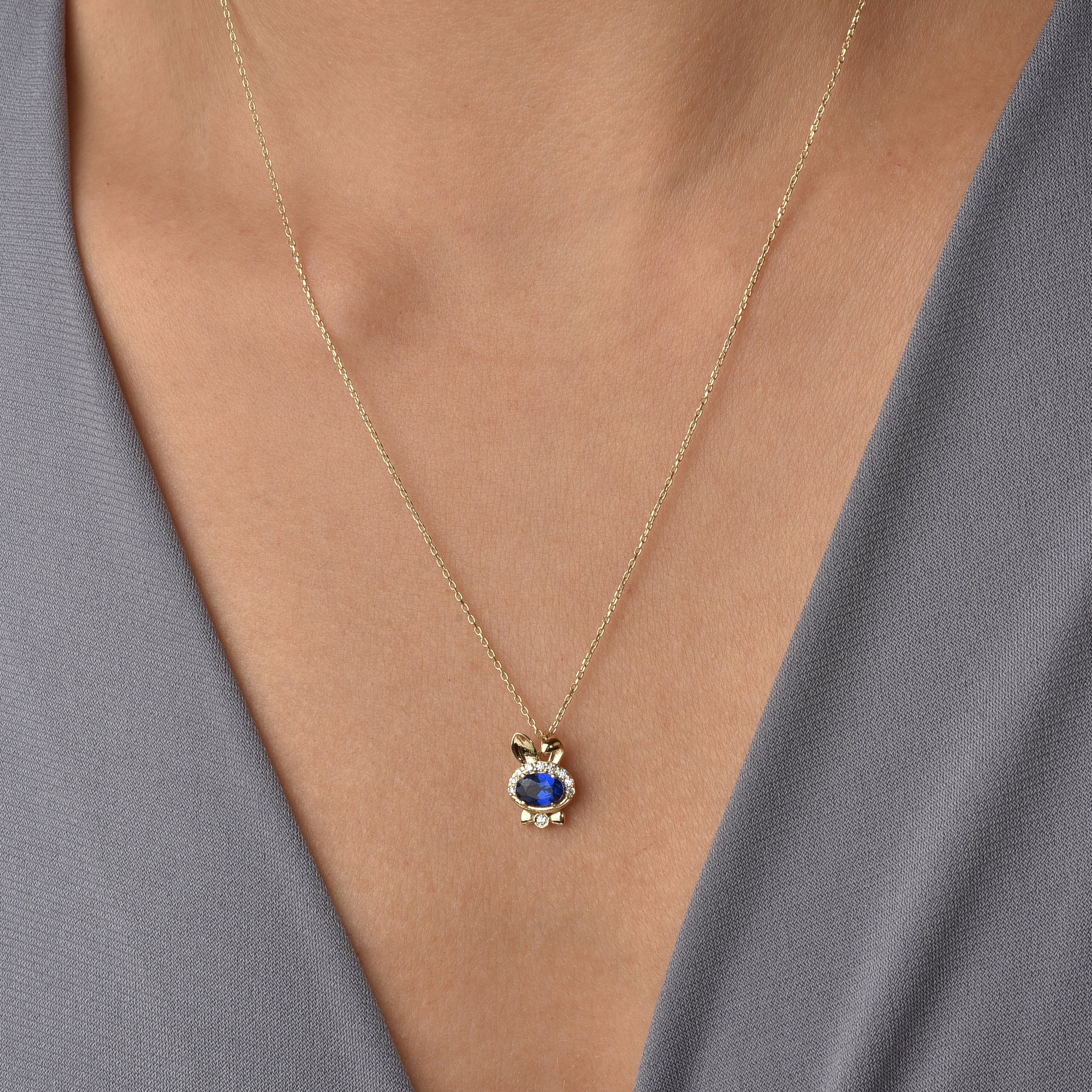 Minimalist rabbit necklace with blue pendant detail Blue Bow Tie Rabbit Necklace 14K Gold / Silver