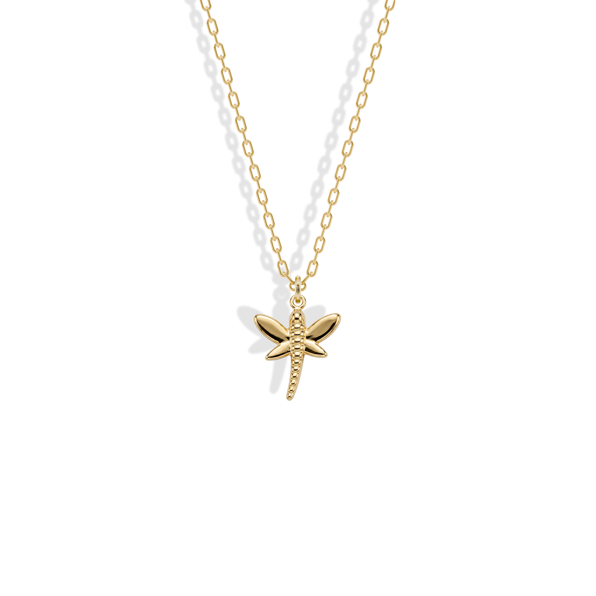 Seen from above, engraved wing veins and a segmented tail form the 14K yellow gold Dragonfly Pendant Necklace