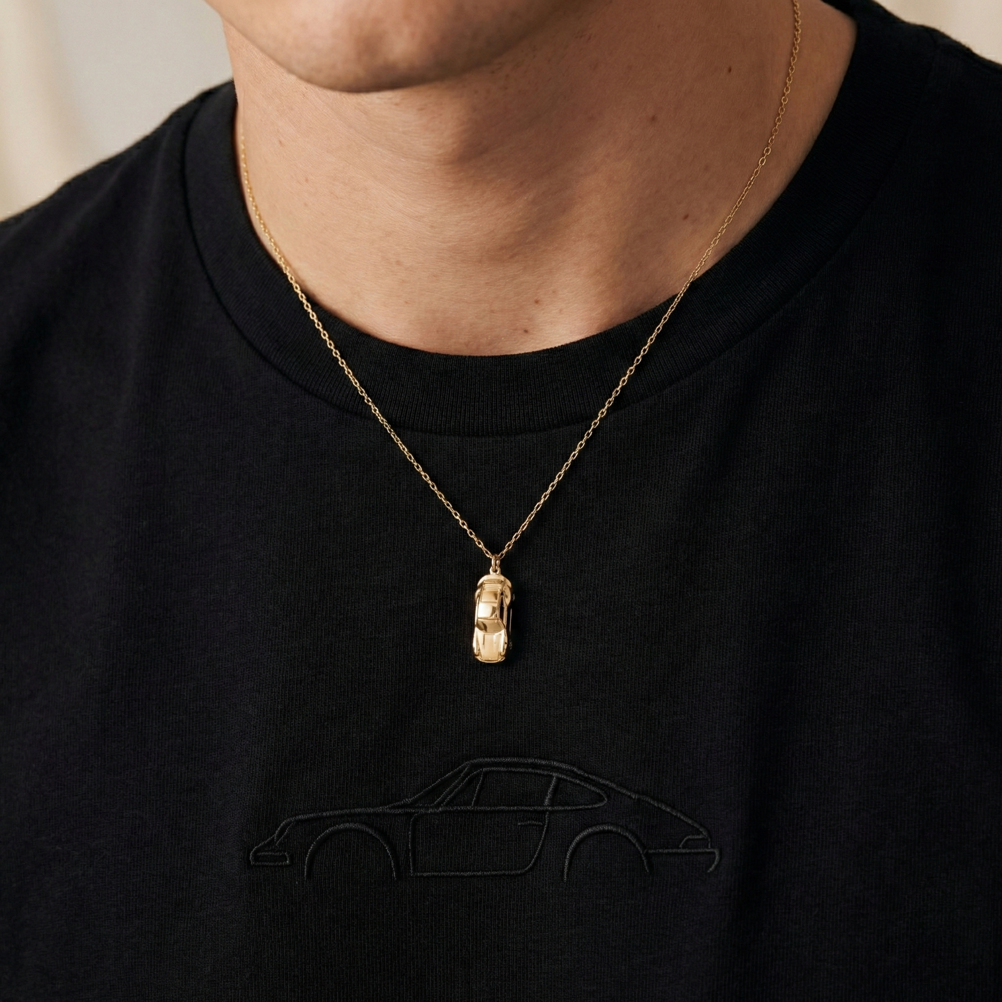 Heritage Coupe Diecast Model Car Necklace 14K Gold Silver diecast necklace on model neck view