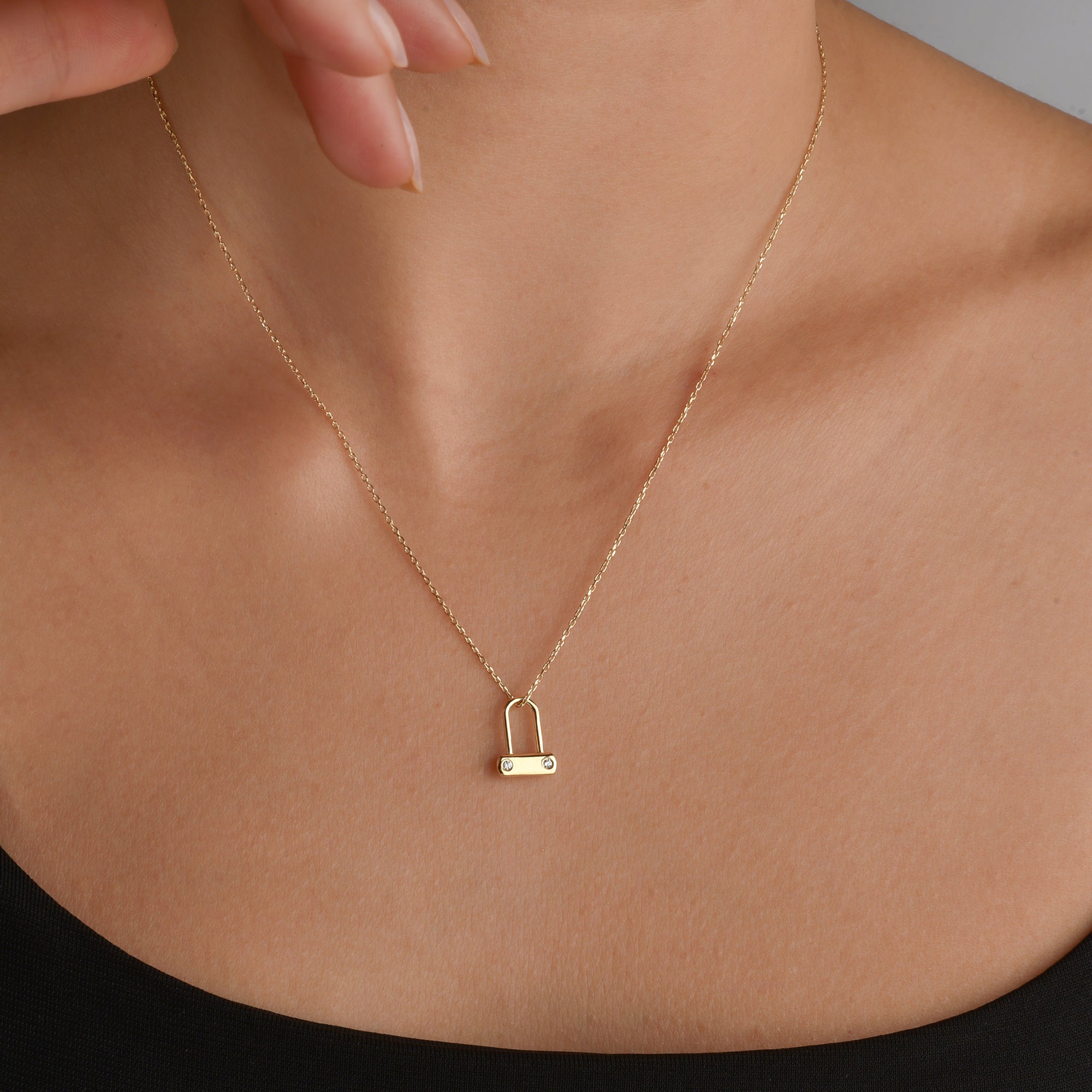 Minimal Stone Lock Necklace Silver version close-up of padlock necklace with custom lock design and subtle stone accent