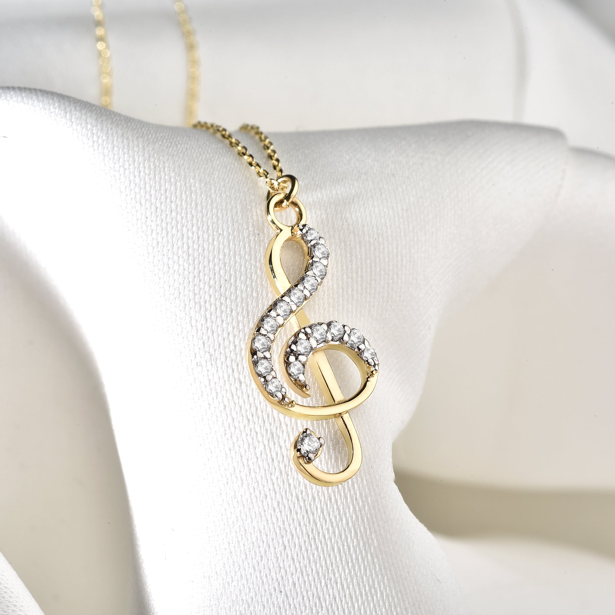 Stone Treble Clef Necklace 14K Gold / Silver – hand crafted musical note necklace inspired by melody jewelry. A meaningful piece for music lovers.