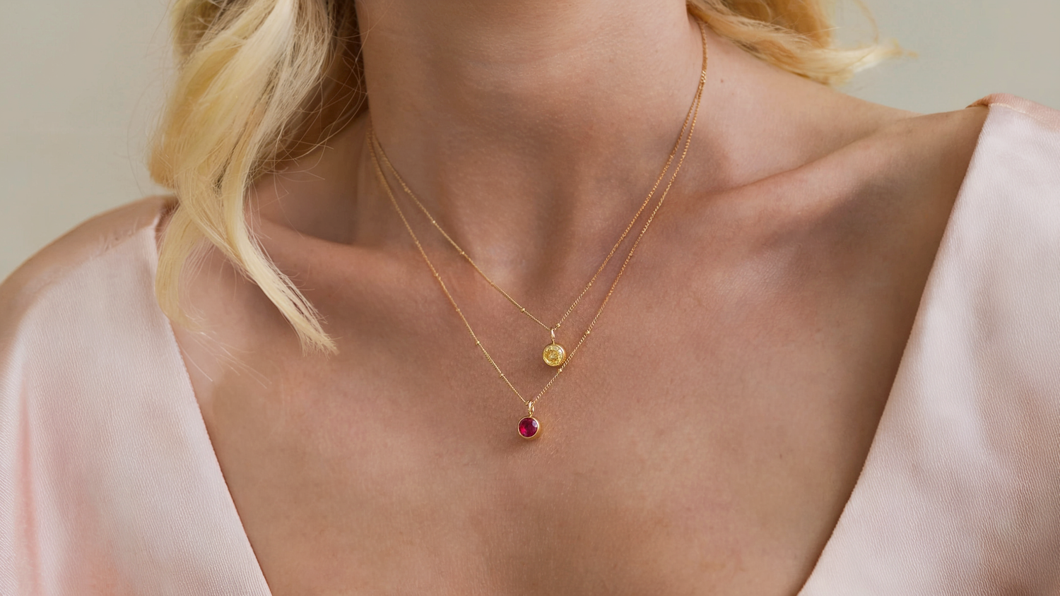 14K solid gold birthstone necklace with vibrant gemstone pendant, perfect for gifting on special occasions.