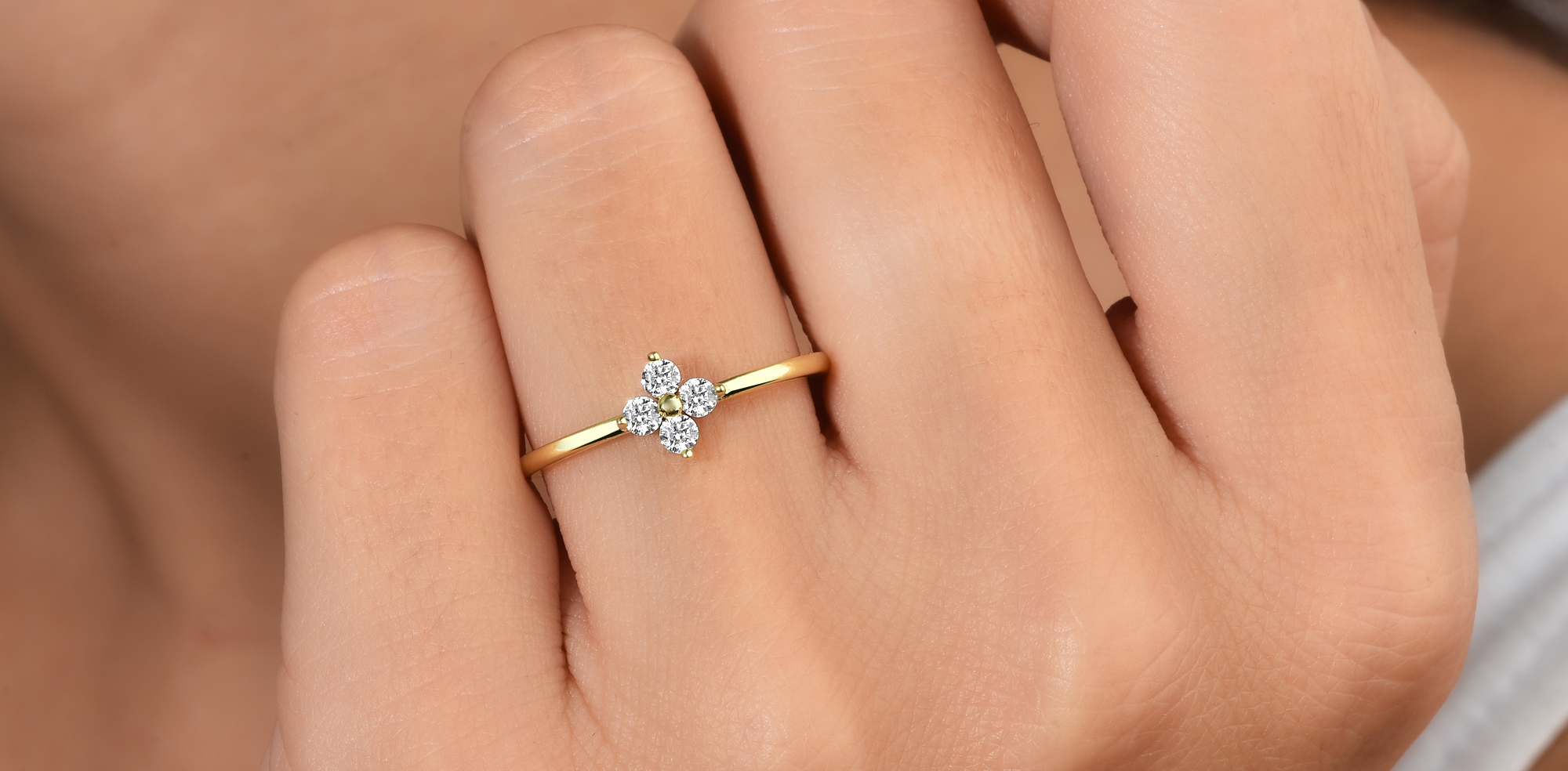 14K gold diamond rings with solitaire, pavé, and minimalist band styles