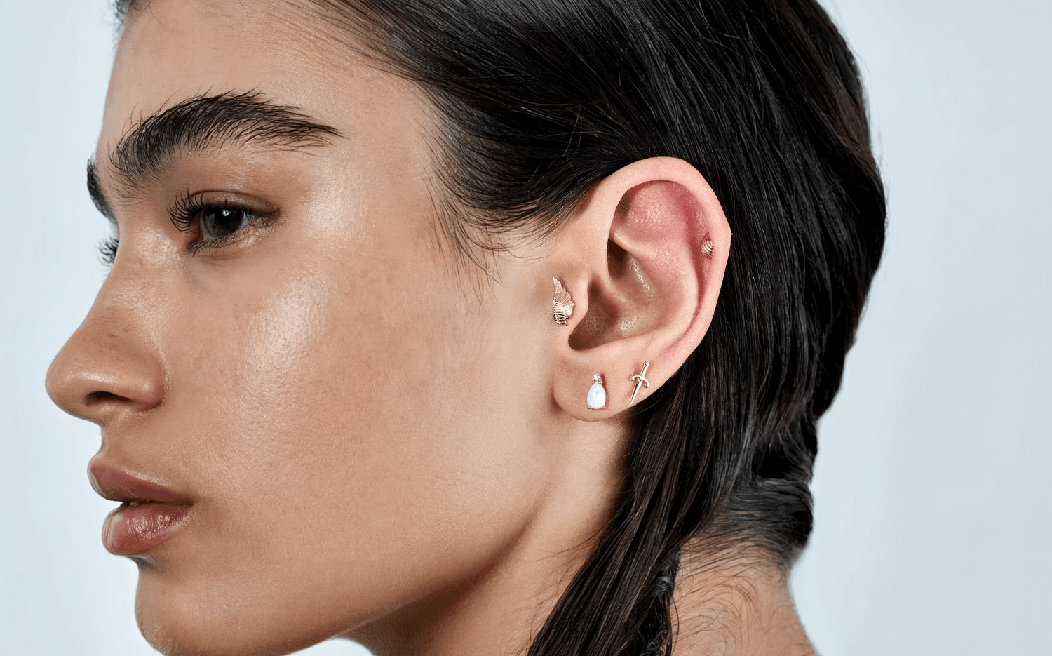 Selection piercing featuring curated ear studs and minimalist ear jewelry designs