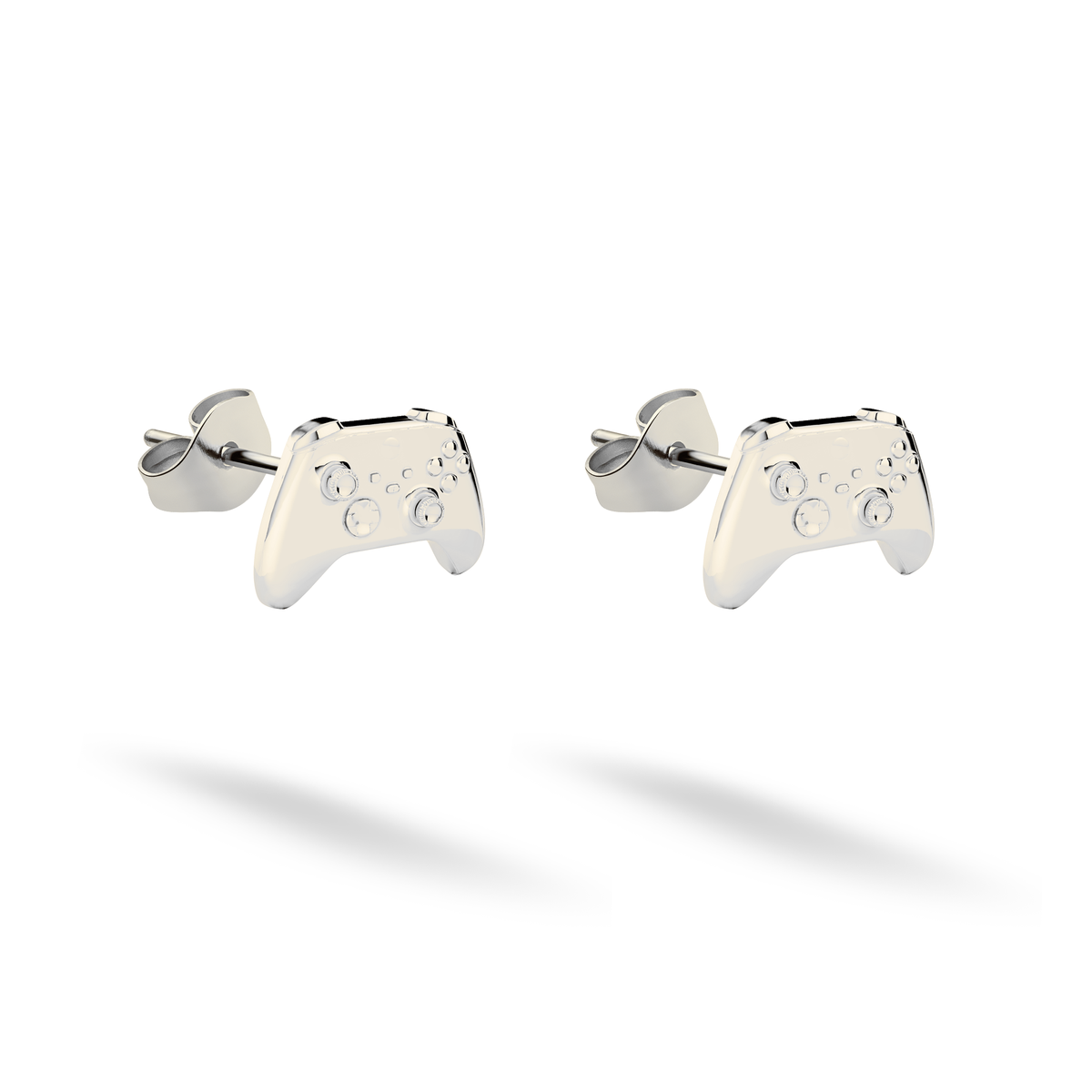 Crisp white gold gives the compact joystick and button details a bright finish