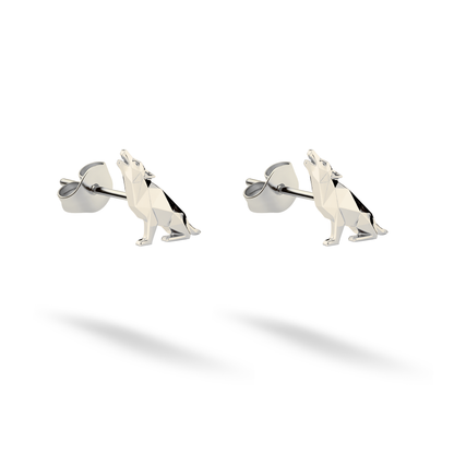 Cool white gold catches along the polygonal back, legs and lifted wolf head