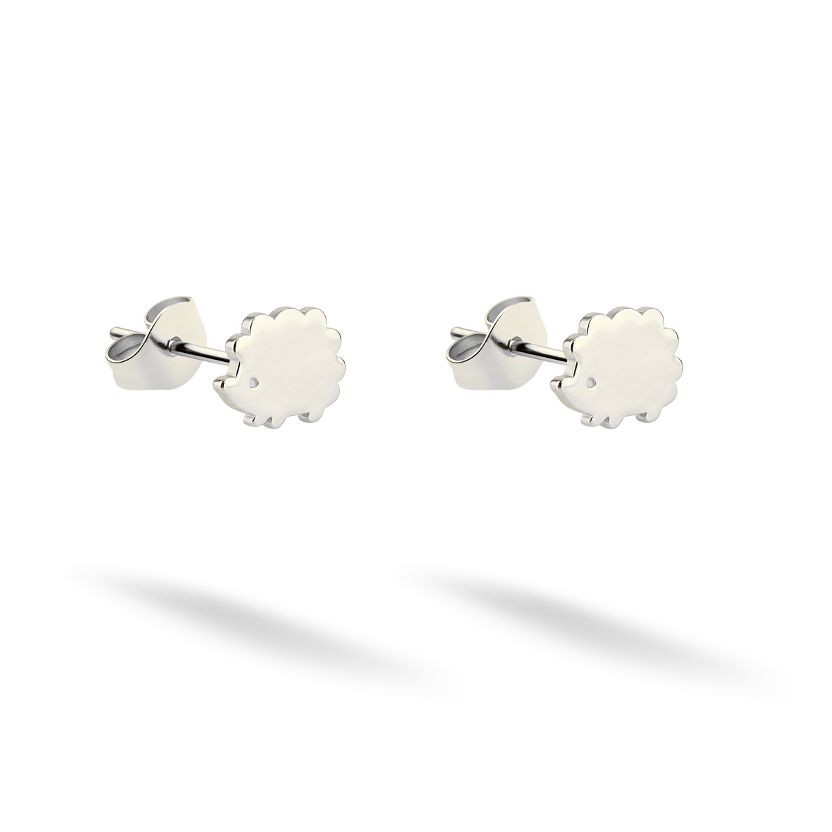 Tiny quilled hedgehog studs photographed in polished 14K white gold