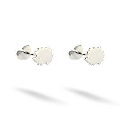 Tiny quilled hedgehog studs photographed in polished 14K white gold
