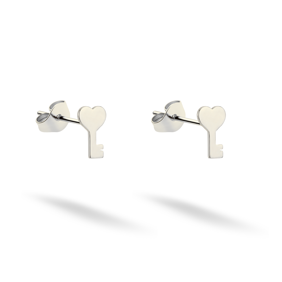 Heart-topped key studs displayed as a pair in crisp 14K white gold