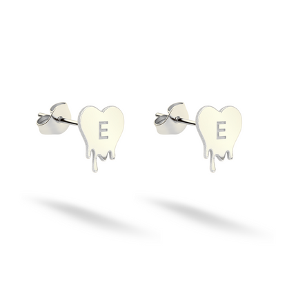 Personalized fluid heart studs displayed in bright 14K white gold