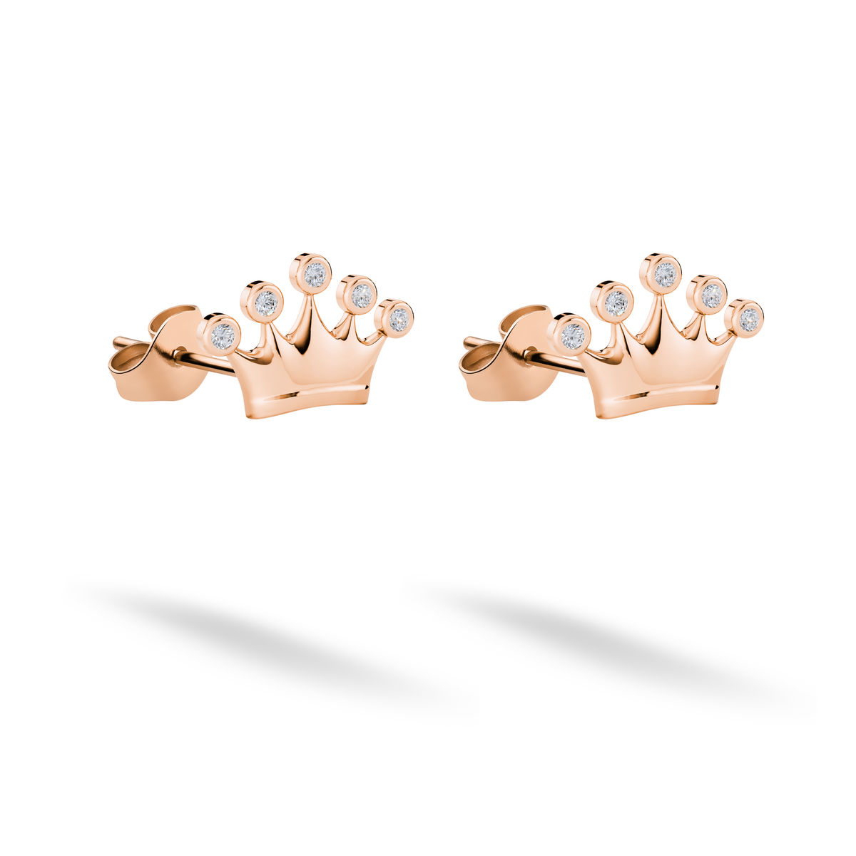 Rose gold warms the miniature tiara outline while the stones remain crisp and luminous