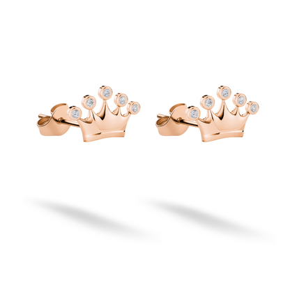 Rose gold warms the miniature tiara outline while the stones remain crisp and luminous