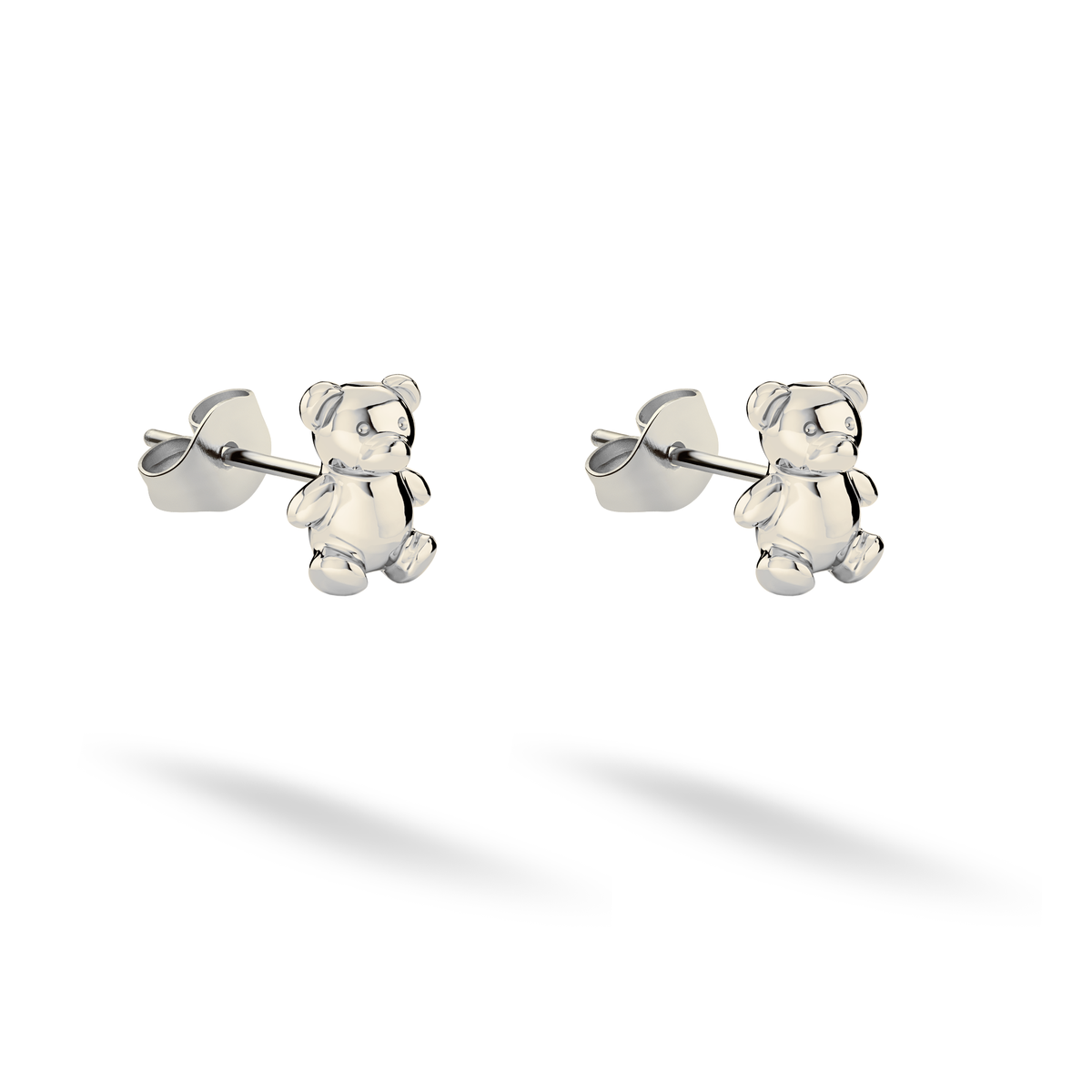 Bright white gold defines the toy bear paws and rounded facial features