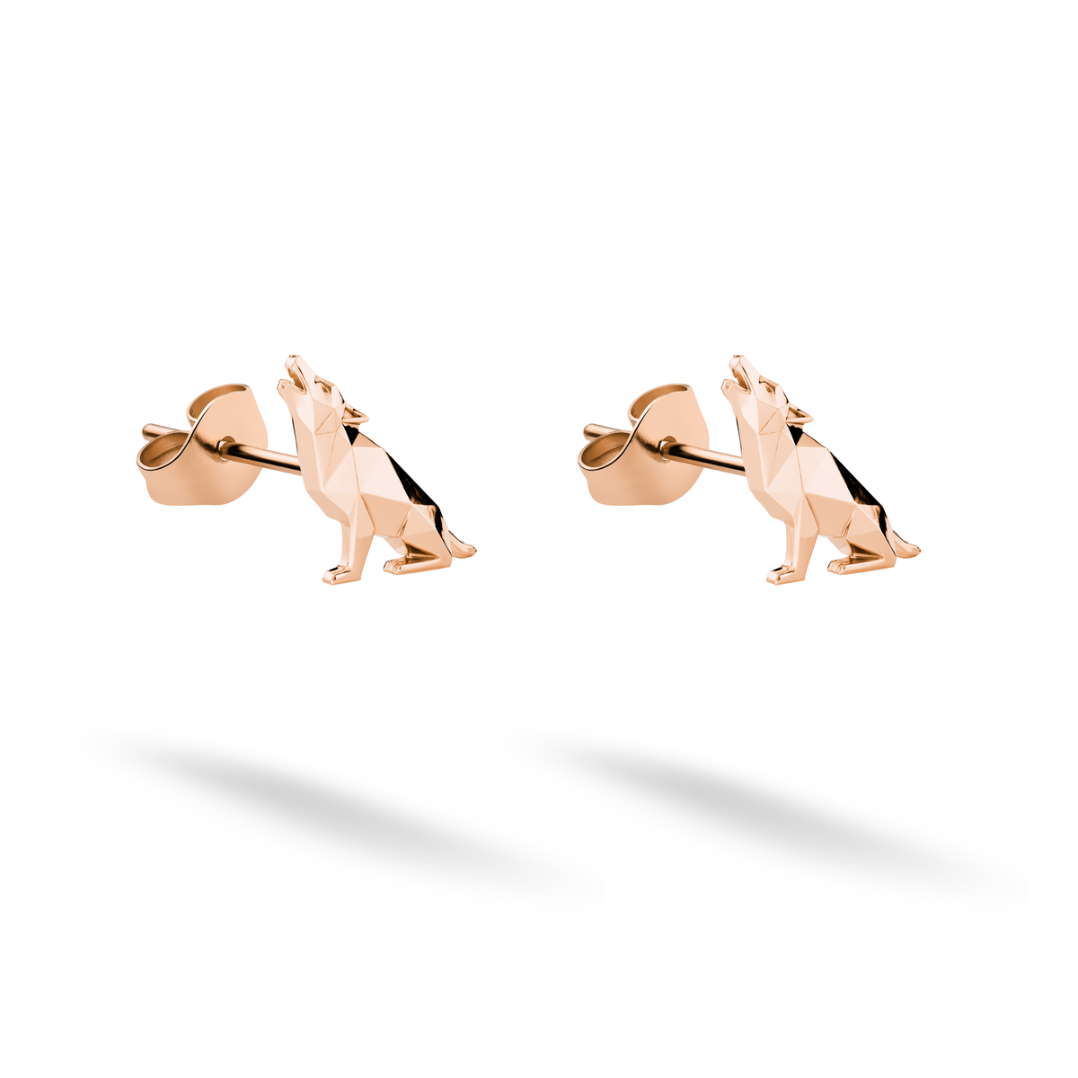The seated canine silhouettes take on a warm sculptural look in 14K rose gold