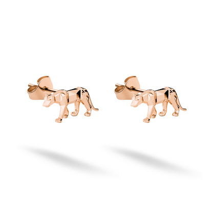 Rose gold creates a warm metallic glow across the elongated feline pair