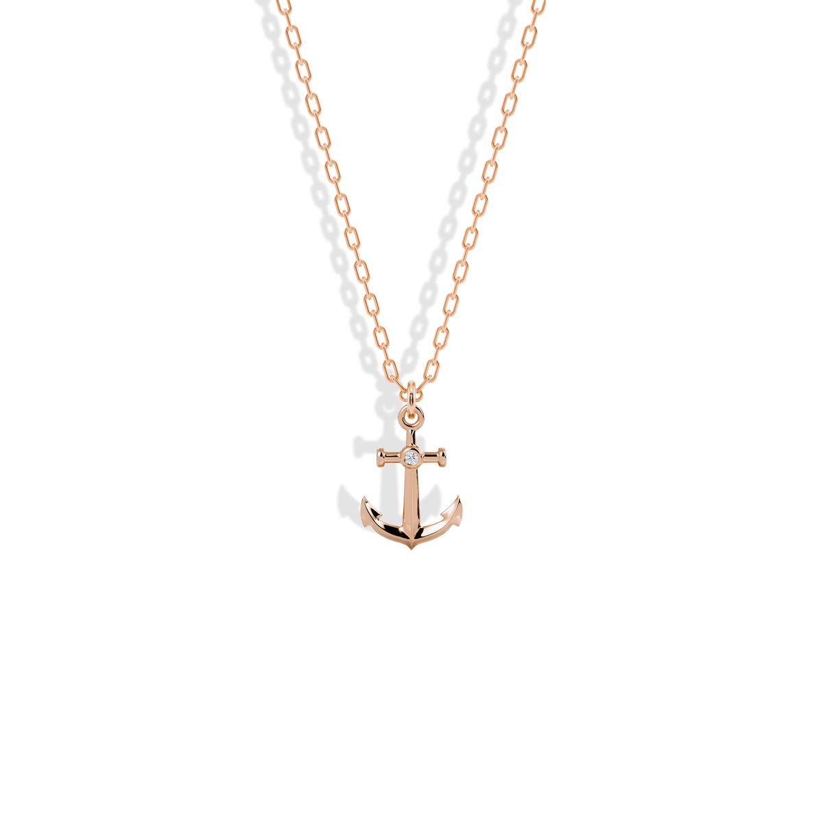Anchor charm in blush 14K rose gold, its centre stone framed by warm pink metal