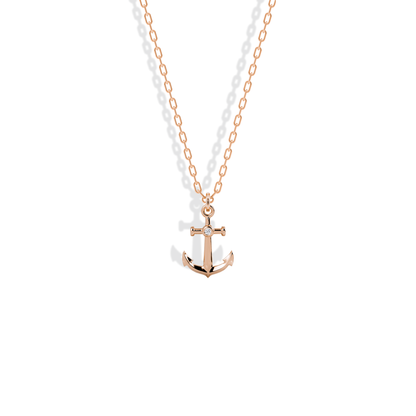 Anchor charm in blush 14K rose gold, its centre stone framed by warm pink metal