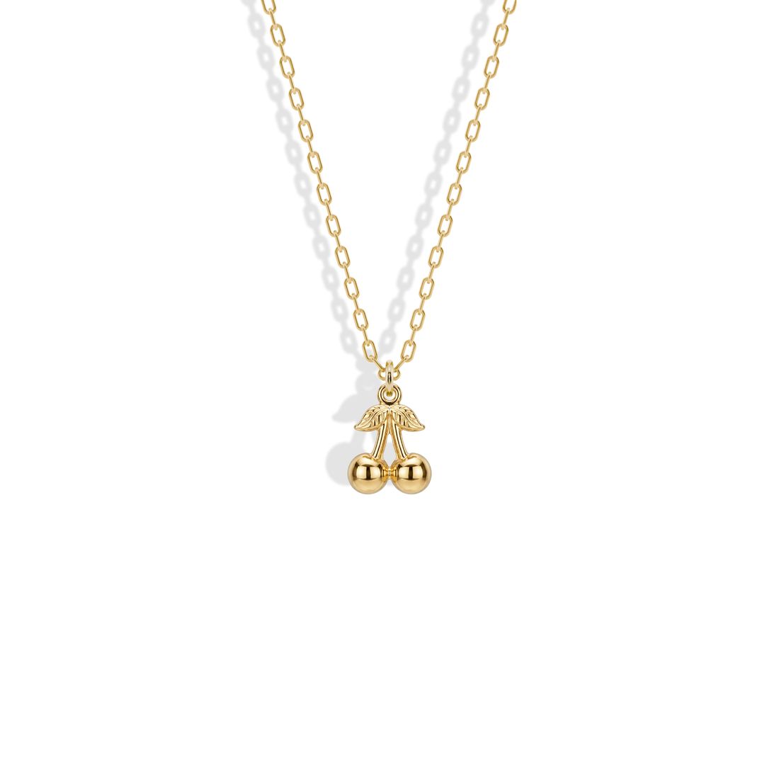 Cherry Pendant Necklace 14K Gold in yellow gold, with two polished cherries and a detailed leafed stem