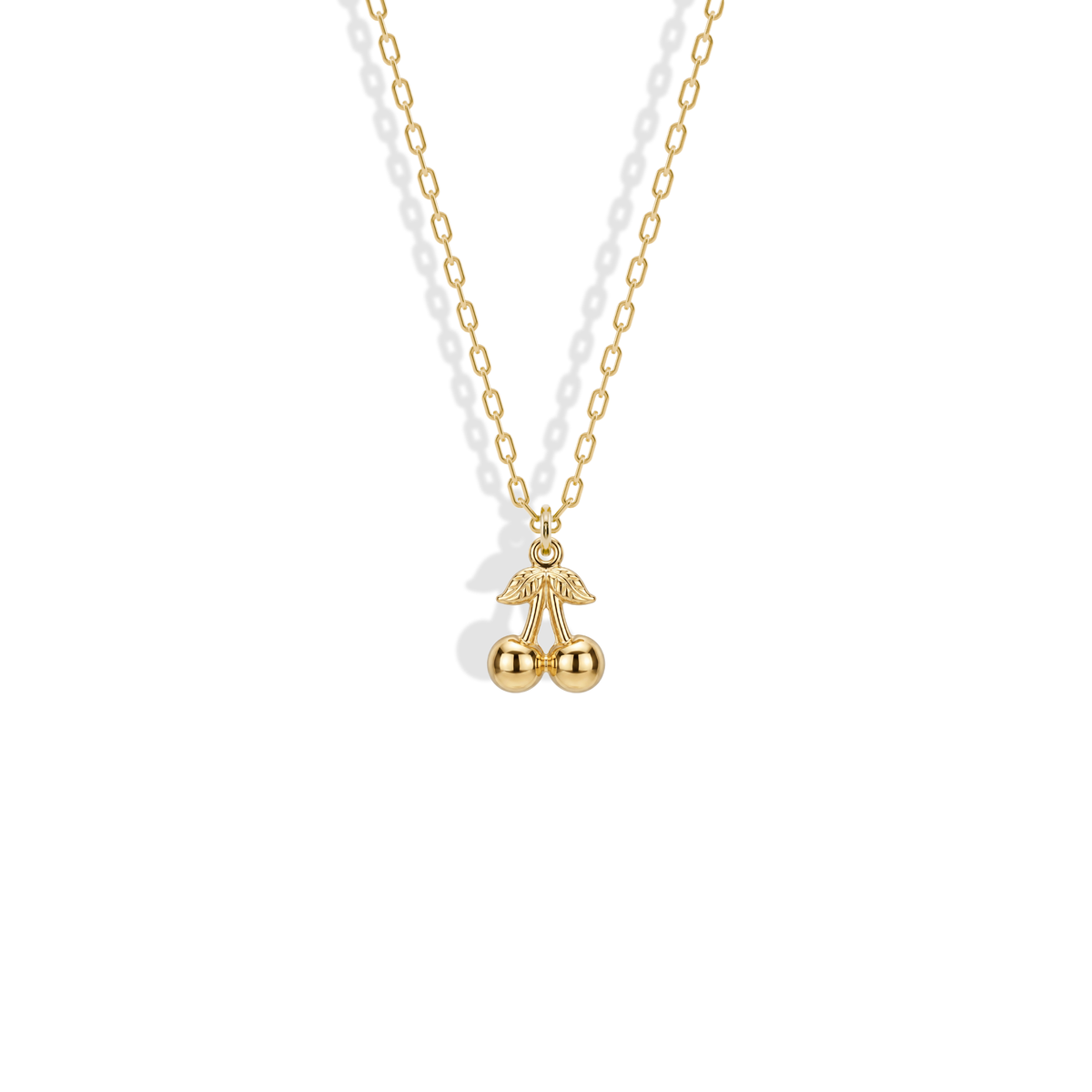 Cherry Pendant Necklace 14K Gold in yellow gold, with two polished cherries and a detailed leafed stem