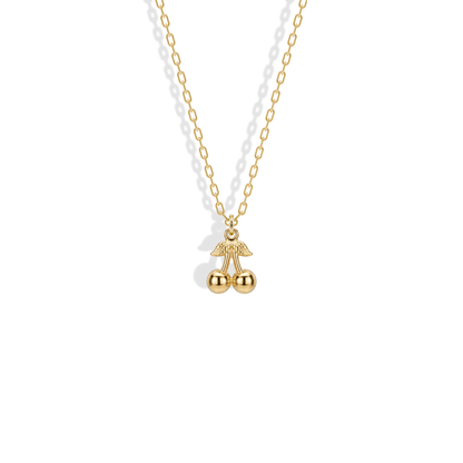 Cherry Pendant Necklace 14K Gold in yellow gold, with two polished cherries and a detailed leafed stem
