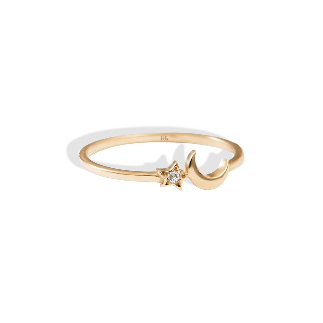 Hand made 14K gold ring featuring a delicate crescent and shimmering diamond star