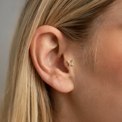 Cute Butterfly Flatback Ear Piercing in 14K Gold or Silver. Nickel free butterfly stud inspired by nature, perfect for animal piercing lovers.