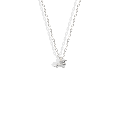 White gold sausage dog charm with a clean silvery finish for cooler jewelry mixes
