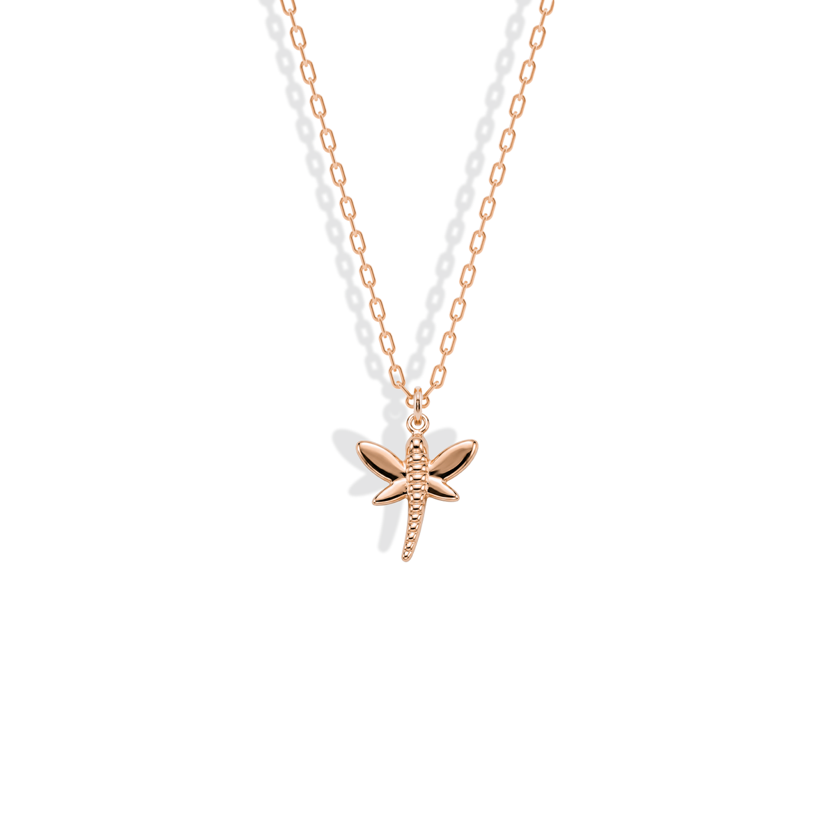 Rose gold gives the patterned dragonfly wings a soft copper glow