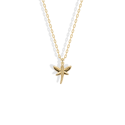 Seen from above, engraved wing veins and a segmented tail form the 14K yellow gold Dragonfly Pendant Necklace