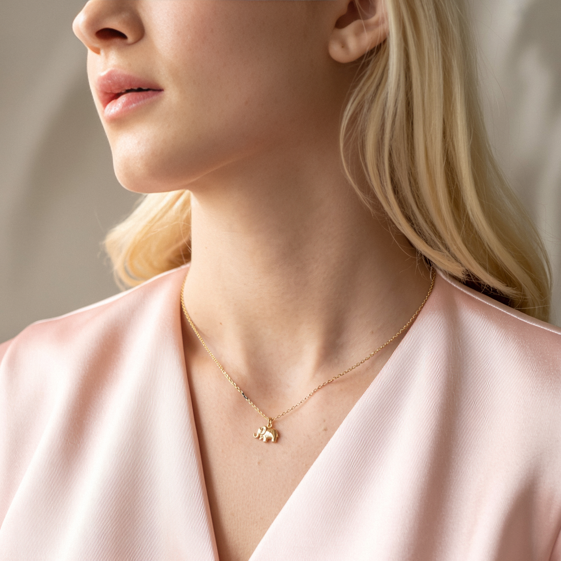 Elephant Pendant Necklace 14K Gold, a meaningful elephant jewelry piece and elephant lover gift inspired by wildlife and nature.