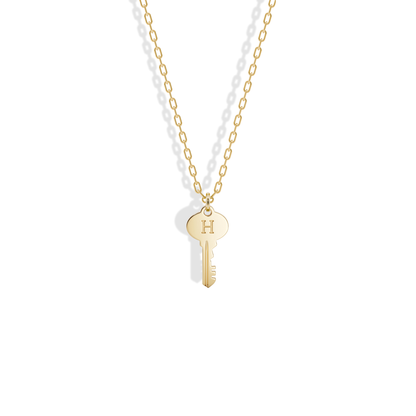 Key Initial Letter Custom Pendant Necklace 14K Gold / Silver, the yellow gold key with a letter engraved on its oval bow