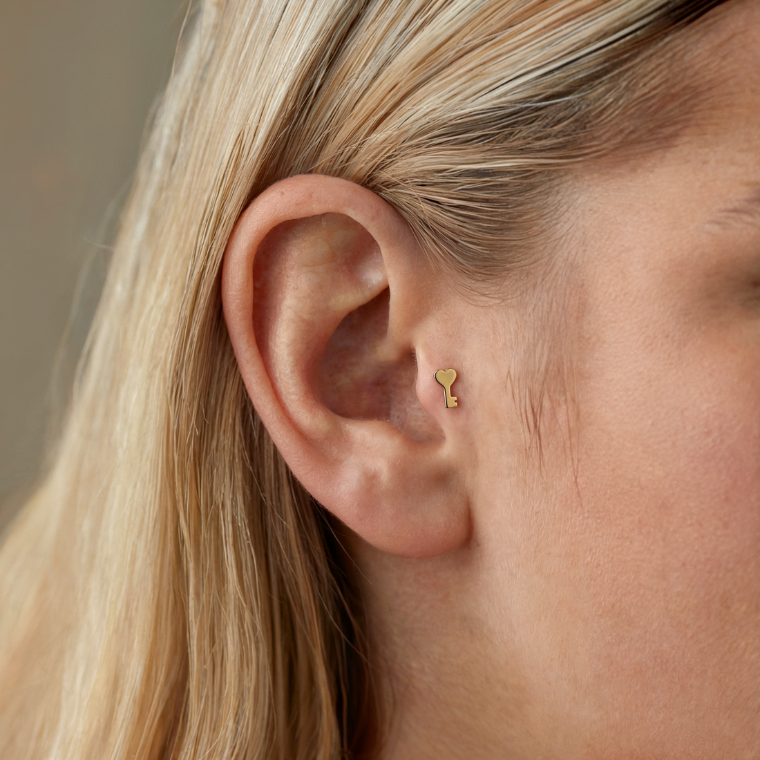 Love Key Flatback Ear Piercing 14K Gold / Silver with tiny heart design. A delicate heart piercing, perfect for Valentine gifting and everyday elegance.