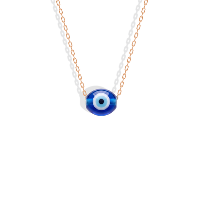 Rose gold chain adds a soft warm frame around the concentric blue eye