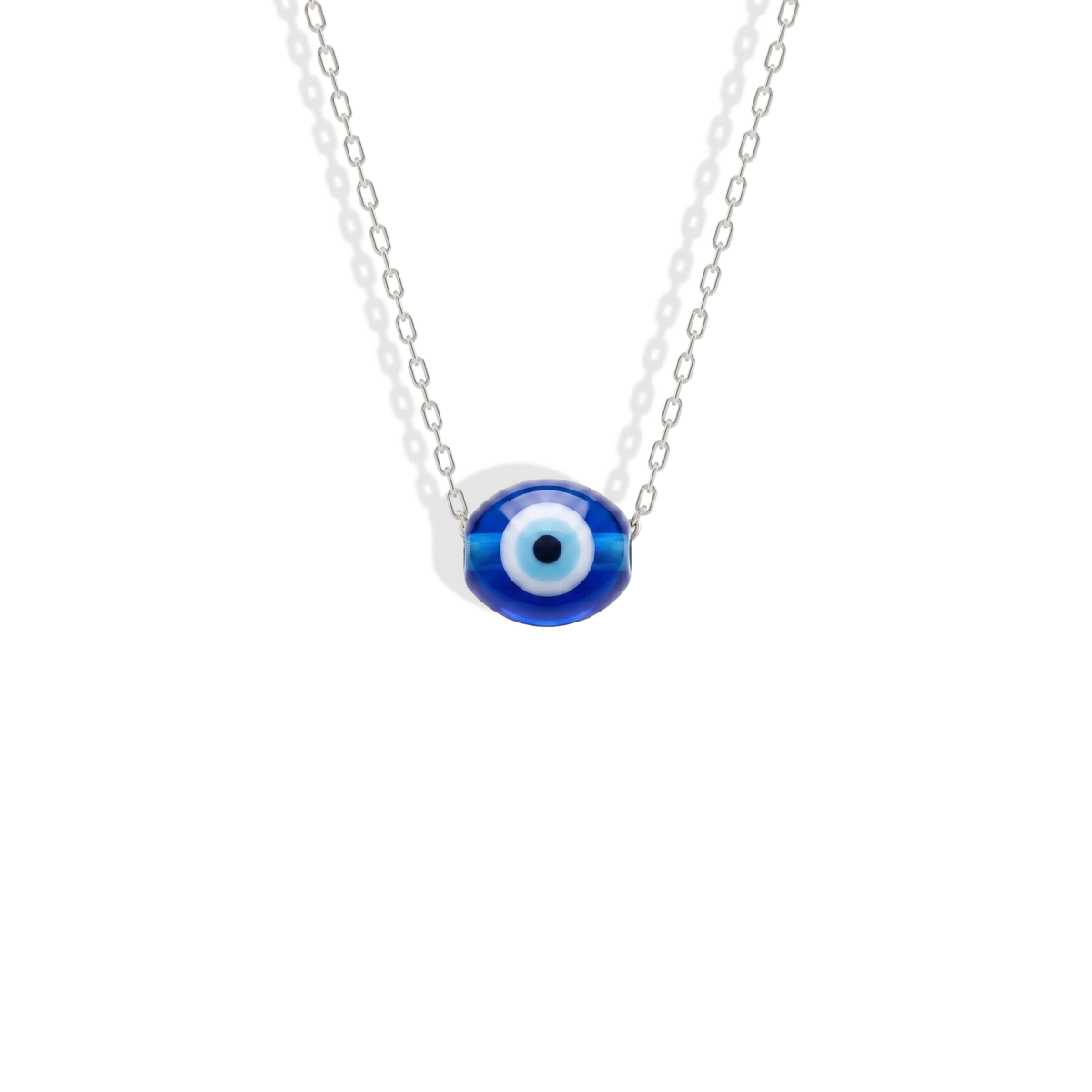 White gold chain pairs a cool silvery line with the saturated blue glass bead
