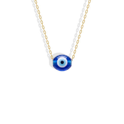 A vivid cobalt oval on a fine 14K yellow gold chain, the Minimal Oval Evil Eye Necklace