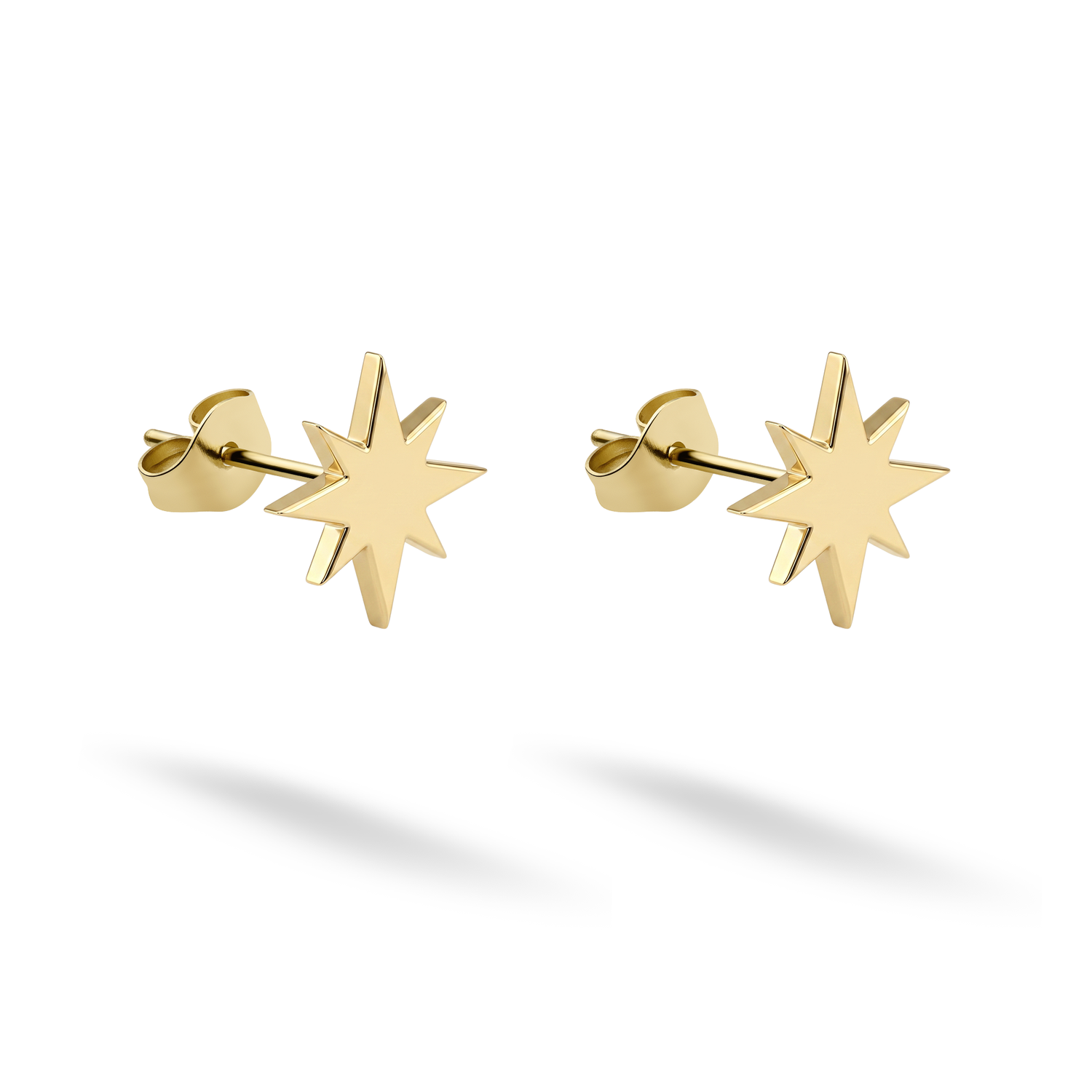 North star stud earrings in 14K gold or silver, perfect for celestial jewelry lovers.