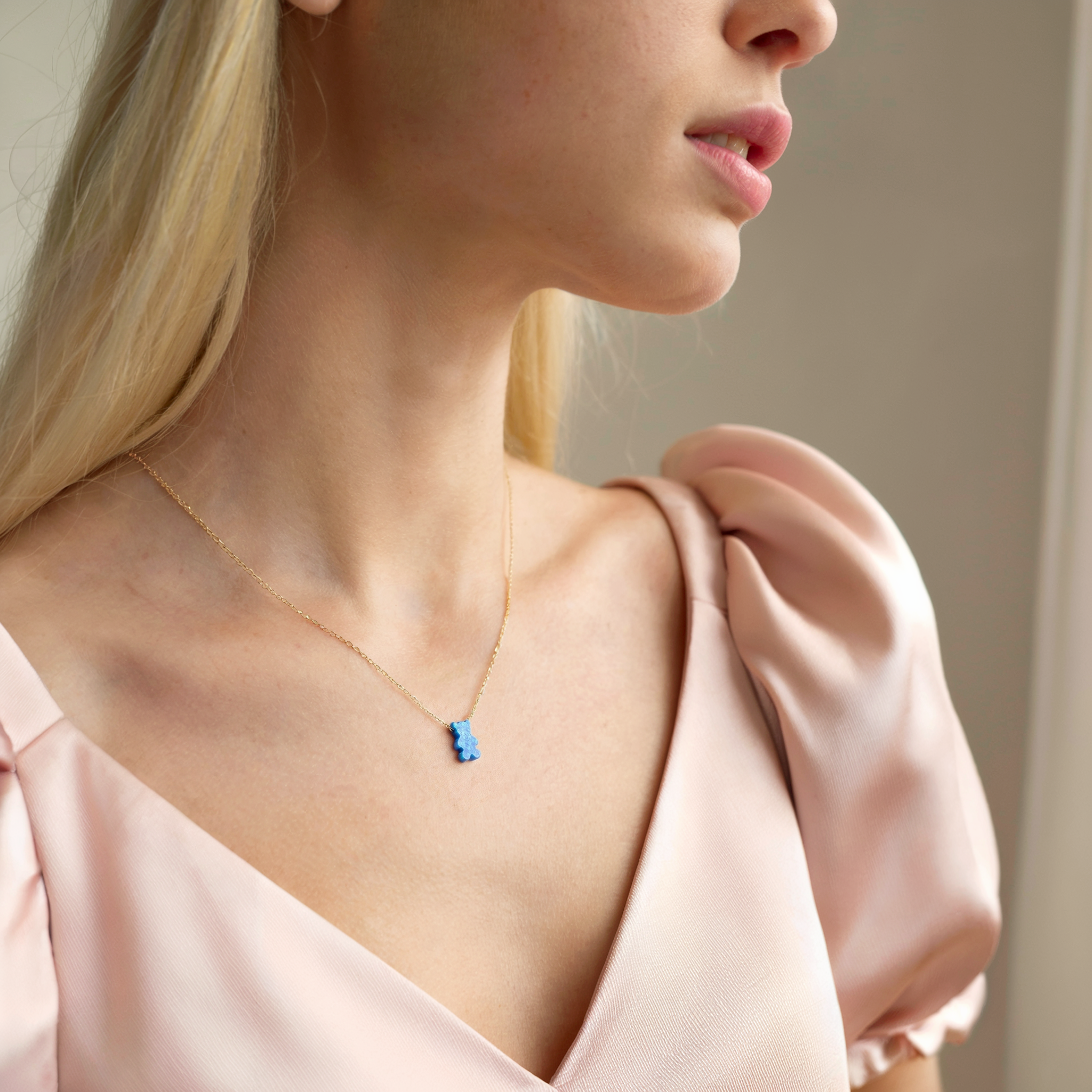 Close-up view of Opal Teddy Bear Necklace 14K Gold / Silver, little bear necklace for kids and animal jewelry lovers