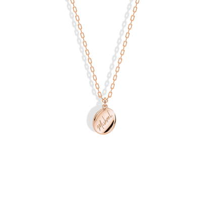 Script name oval finished in 14K rose gold for a soft, feminine look
