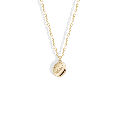 A flowing script name on a softly domed yellow gold oval, the Oval Name Custom Necklace 14K Gold / Silver