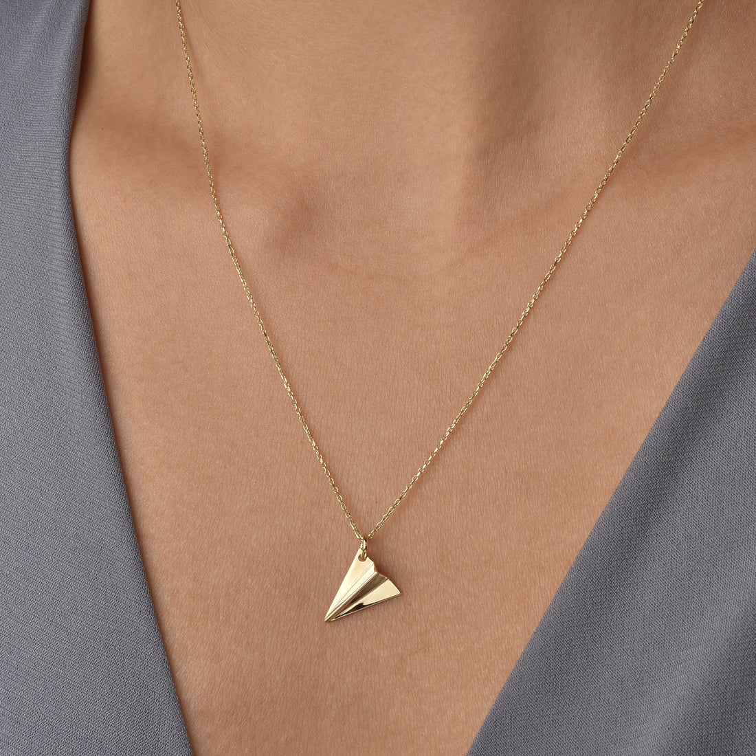 Elegant Paper Airplane Necklace 14K Gold / Silver with a delicate origami airplane necklace design