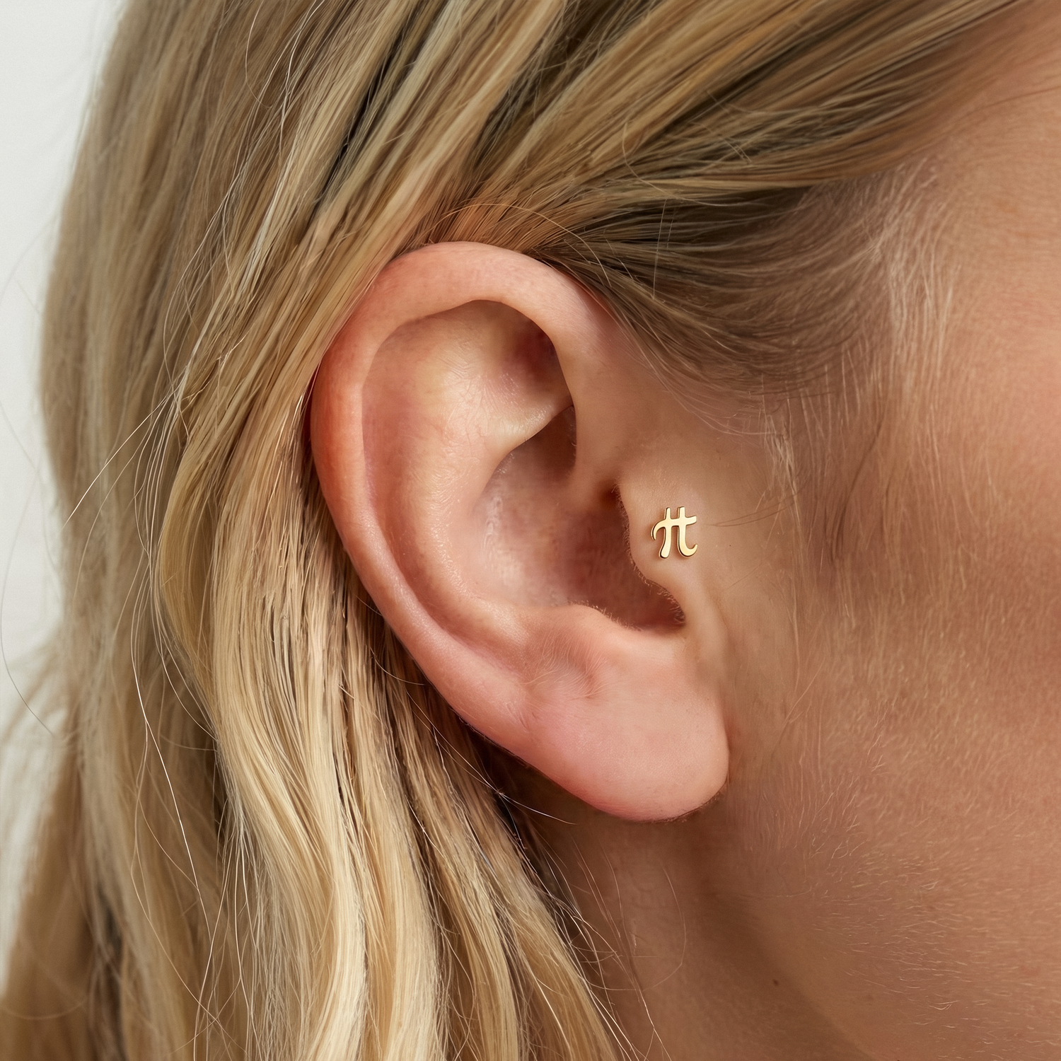 Pi Symbol flatback ear piercing in 14K Gold or Silver, featuring a Mathematical Pi design. A unique Math Pi Symbol jewelry piece for math lovers.
