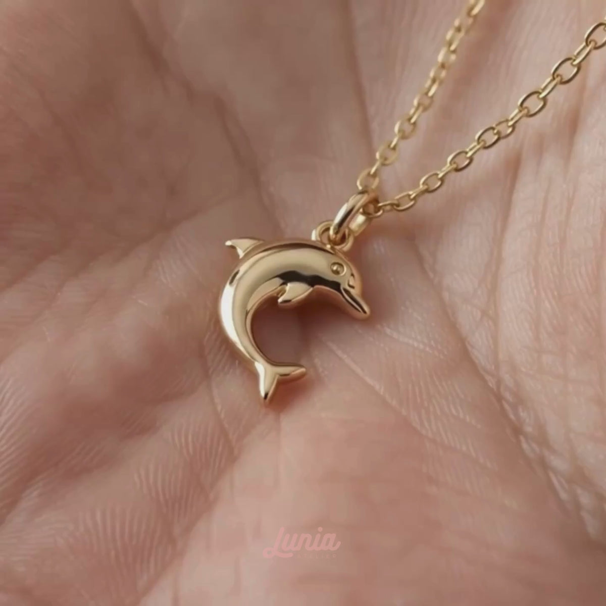 Classic Dolphin Pendant Necklace 14K Gold shown in motion