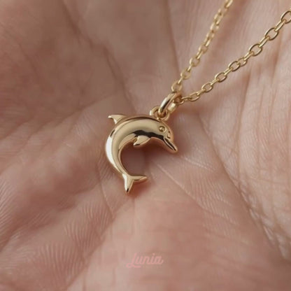 Classic Dolphin Pendant Necklace 14K Gold shown in motion