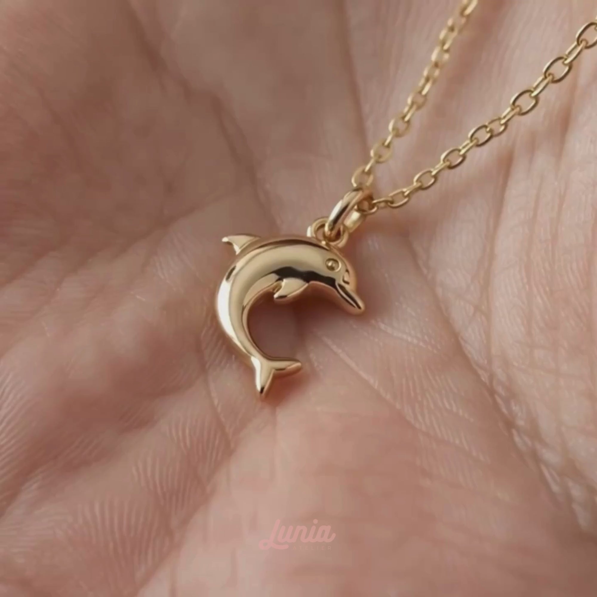 Classic Dolphin Pendant Necklace 14K Gold shown in motion