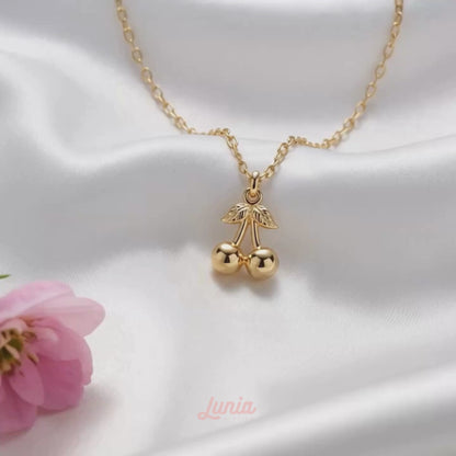 Cherry Pendant Necklace 14K Gold shown in motion