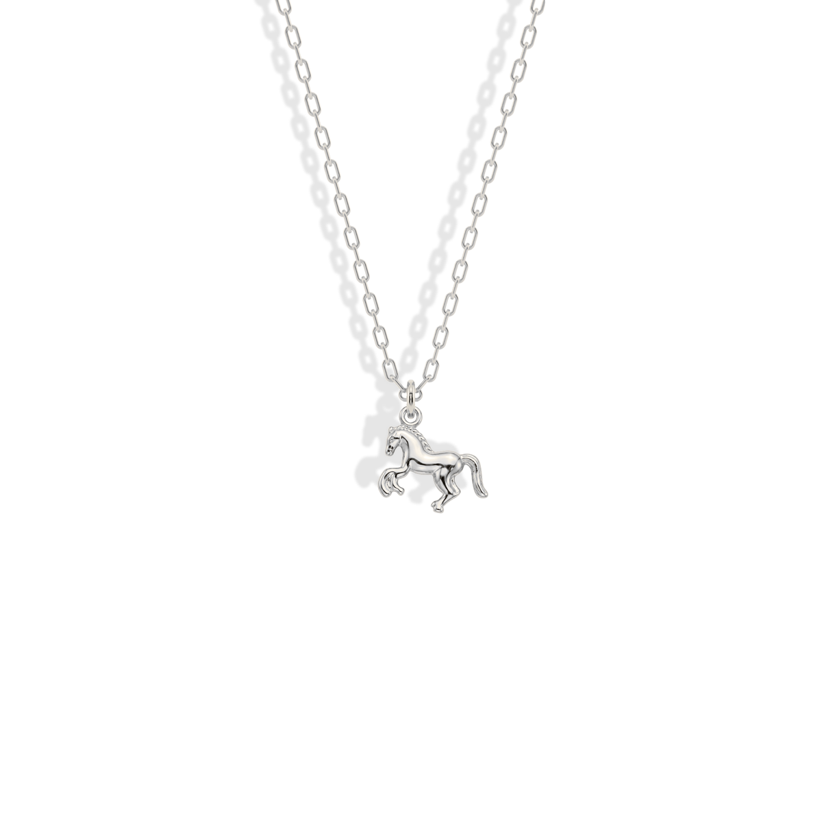 White gold horse pendant with a cool polish that clarifies the lifted legs