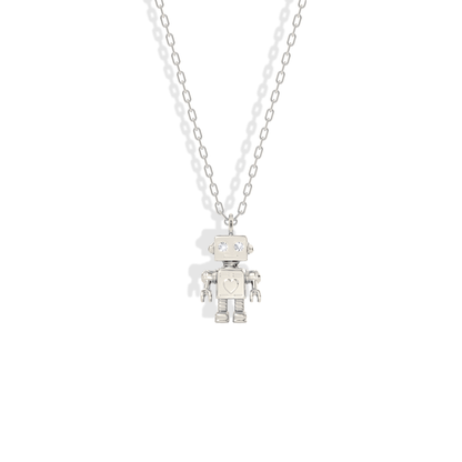 Silver-white 14K gold robot, the stone at its chest standing out against cool metal